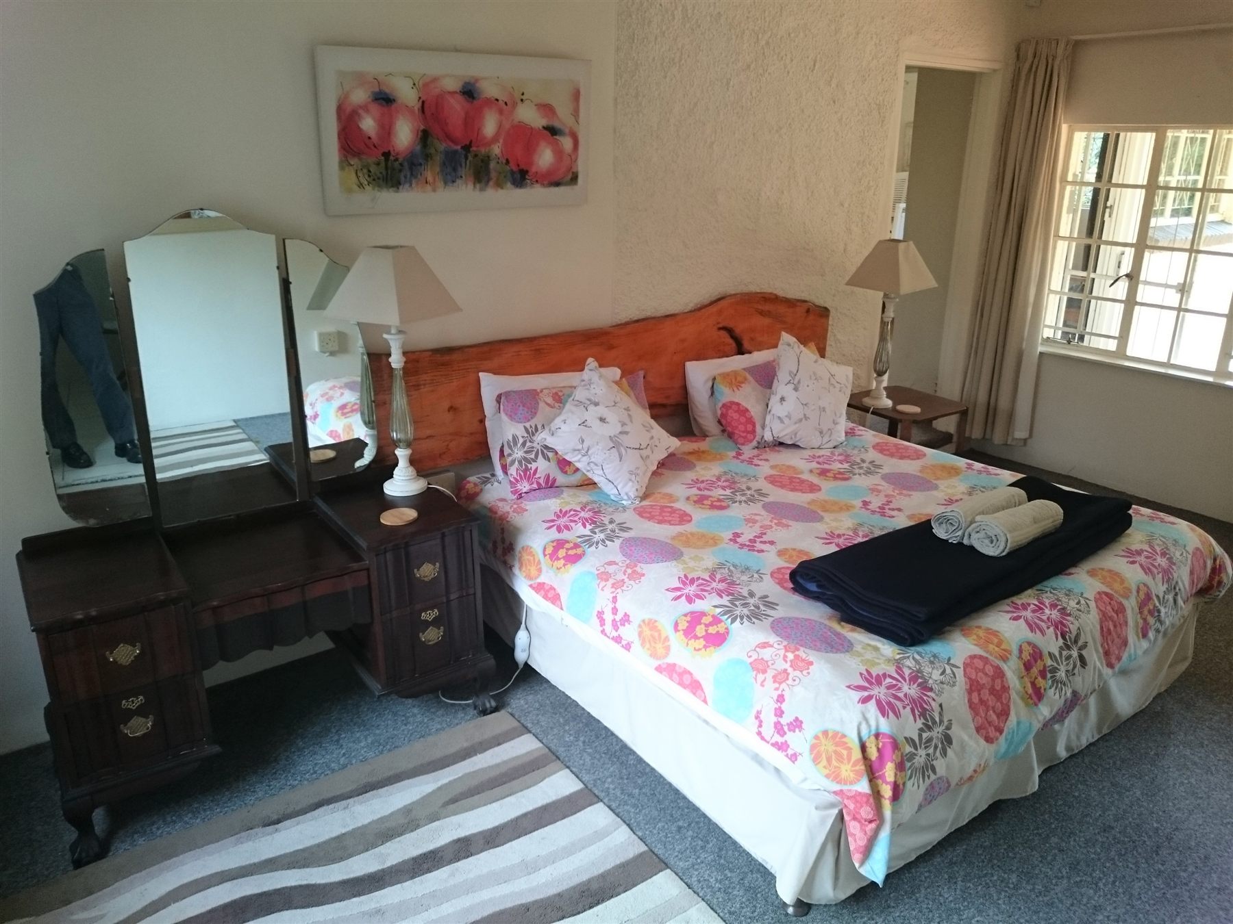 A bedroom at Hydrangea Cottage